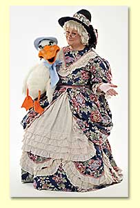 Picture of Goosie - a Steve Axtell puppet - introduced by M. Goose, a children's entertainer promoting reading.